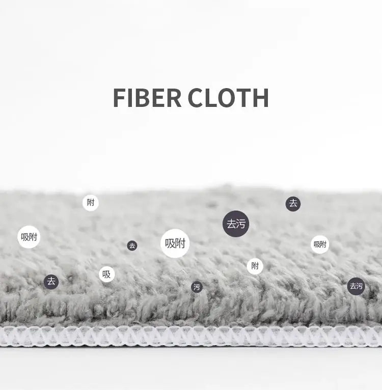 Fiber cloth close-up with textured microfiber surface and stitched edge