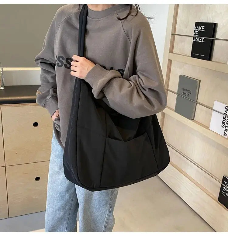 Trendy women's soft black cloth shoulder bag, large tote crossbody for casual looks