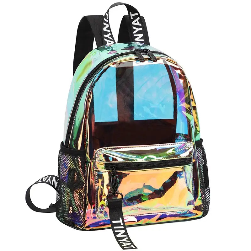 TINYAT clear PVC backpack with iridescent rainbow finish, front zip pocket, mesh side pockets, and black logo straps