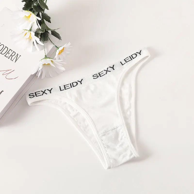 White thong underwear with a branded SEXY LEIDY elastic waistband; low-rise, breathable cotton gusset