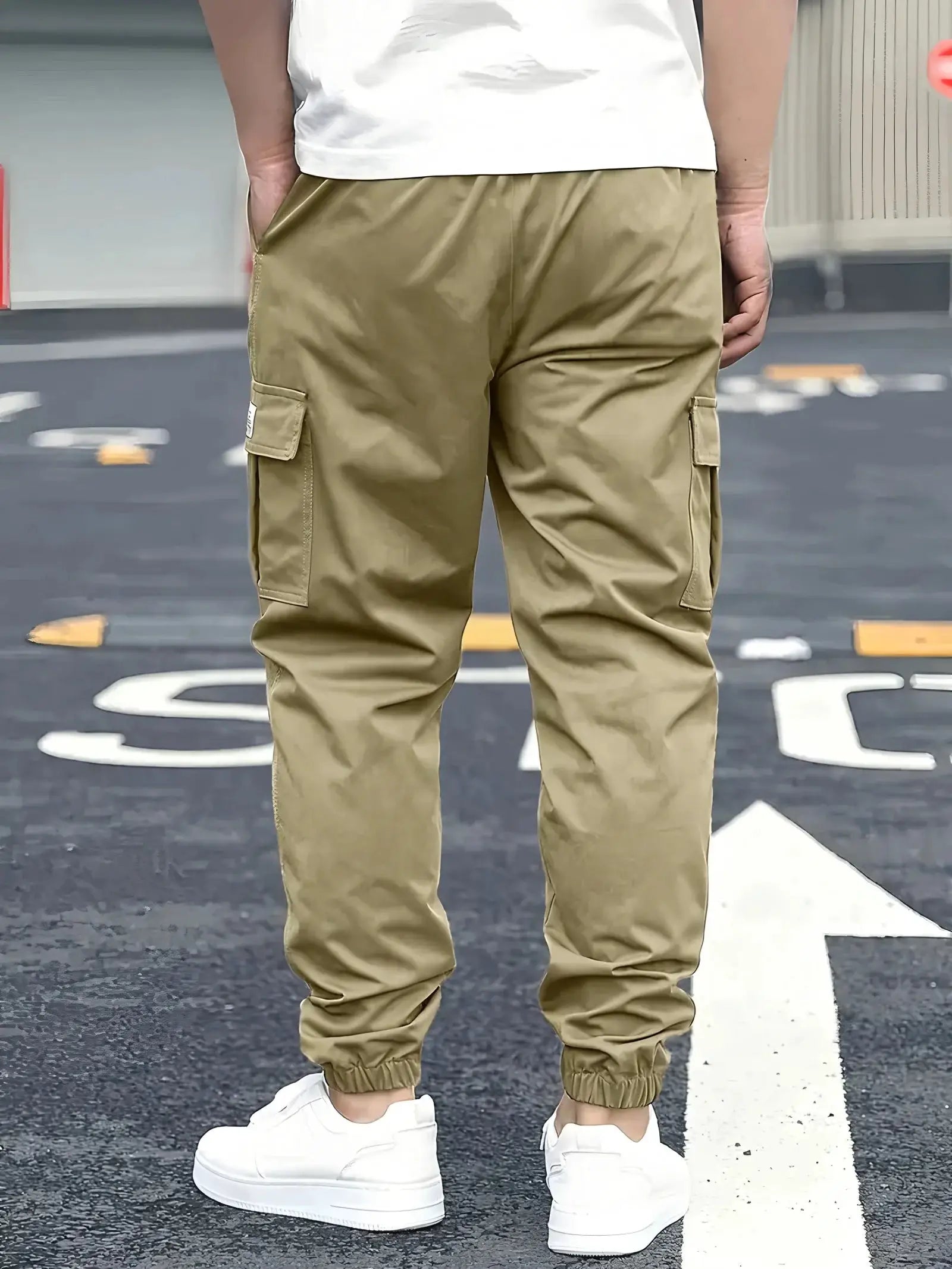 Men's cargo jogger pants in khaki with multiple pockets and elastic cuffs