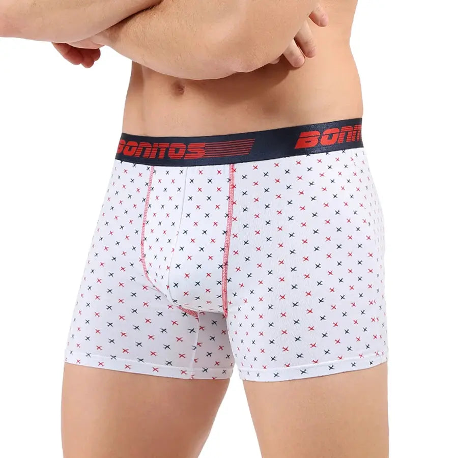 Men's cotton print boxers with white base and red/black X pattern, navy elastic waistband