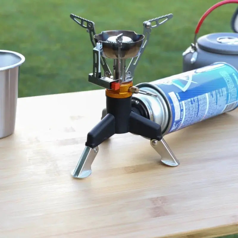 Simples Market camping gas stove with folding stainless steel tripod stand and propane canister
