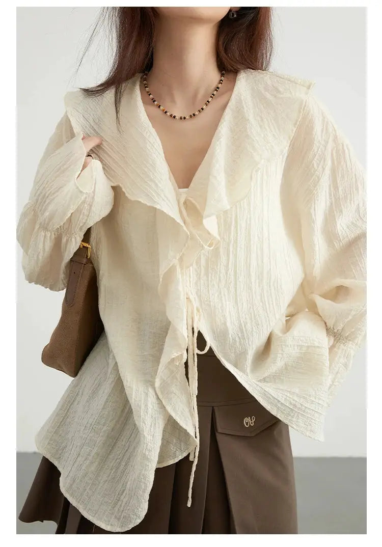 CHIC VEN women's cream textured blouse with loose fit, ruffled edges and lace-up V-neck