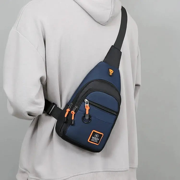 Men's navy blue crossbody sling bag with orange zipper pulls, Simples Market waterproof outdoor hiking bag
