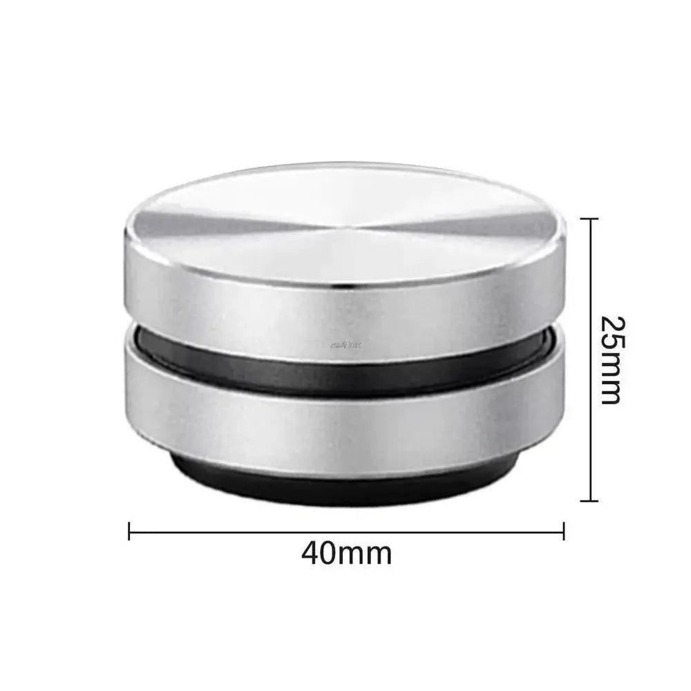 Bone conduction Bluetooth speaker, round silver metal body with black ring, 40mm diameter, 25mm tall