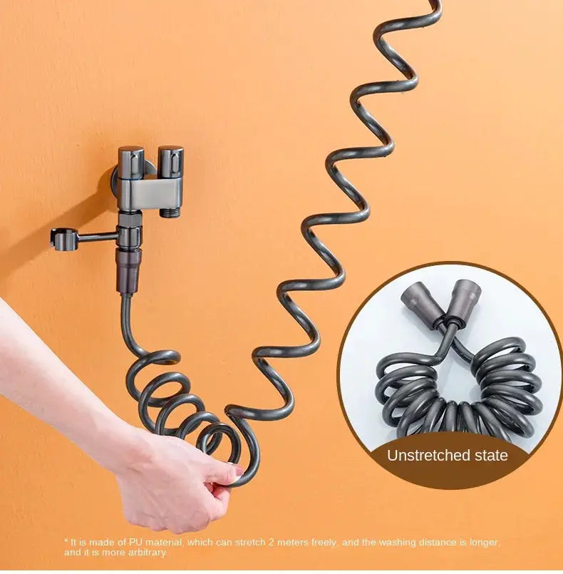 Wall-mounted double-outlet angle valve bidet sprayer with coiled hose in dark gray