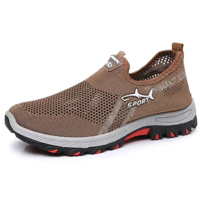 Men's brown breathable mesh sneakers with slip-on design and rugged red-tipped outsole