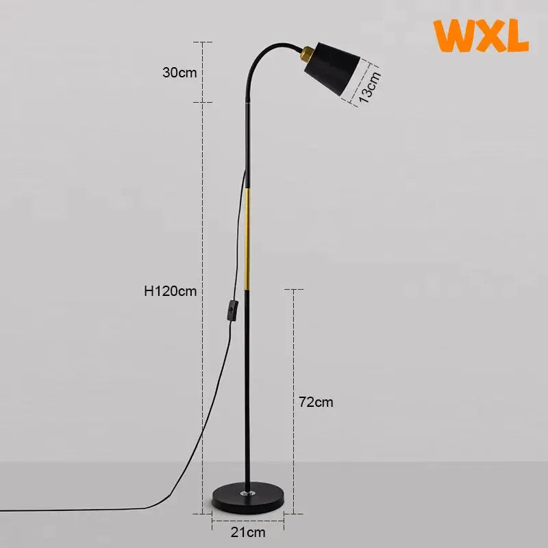 Floor lamp with black wrought-iron stem, yellow accent, adjustable head; WXL logo visible.