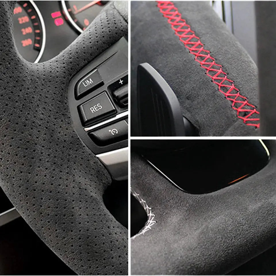 Car steering wheel cover in suede with red cross-stitch braid detail on perforated black material