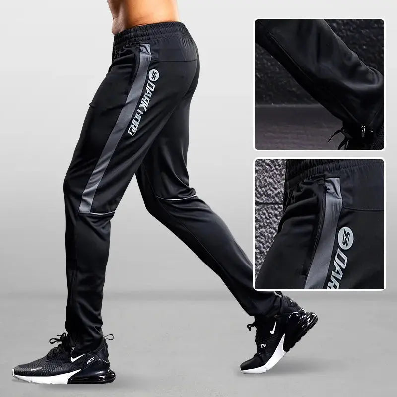 Men sport pants with zipper pockets, black joggers with side stripe and logo