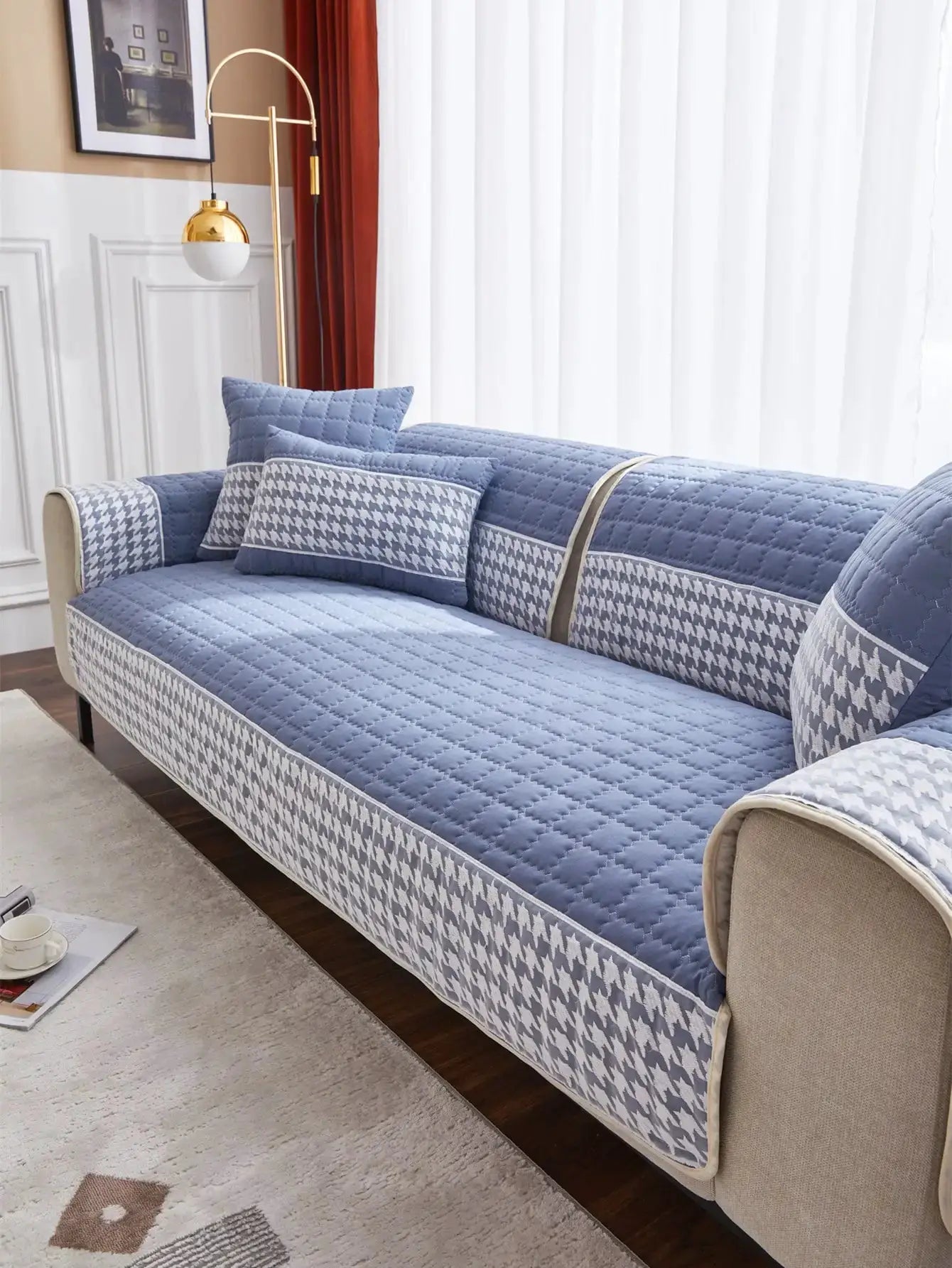 Sofa slipcovers set in blue houndstooth quilted fabric with anti-slip backing by Simples Market for living room couch