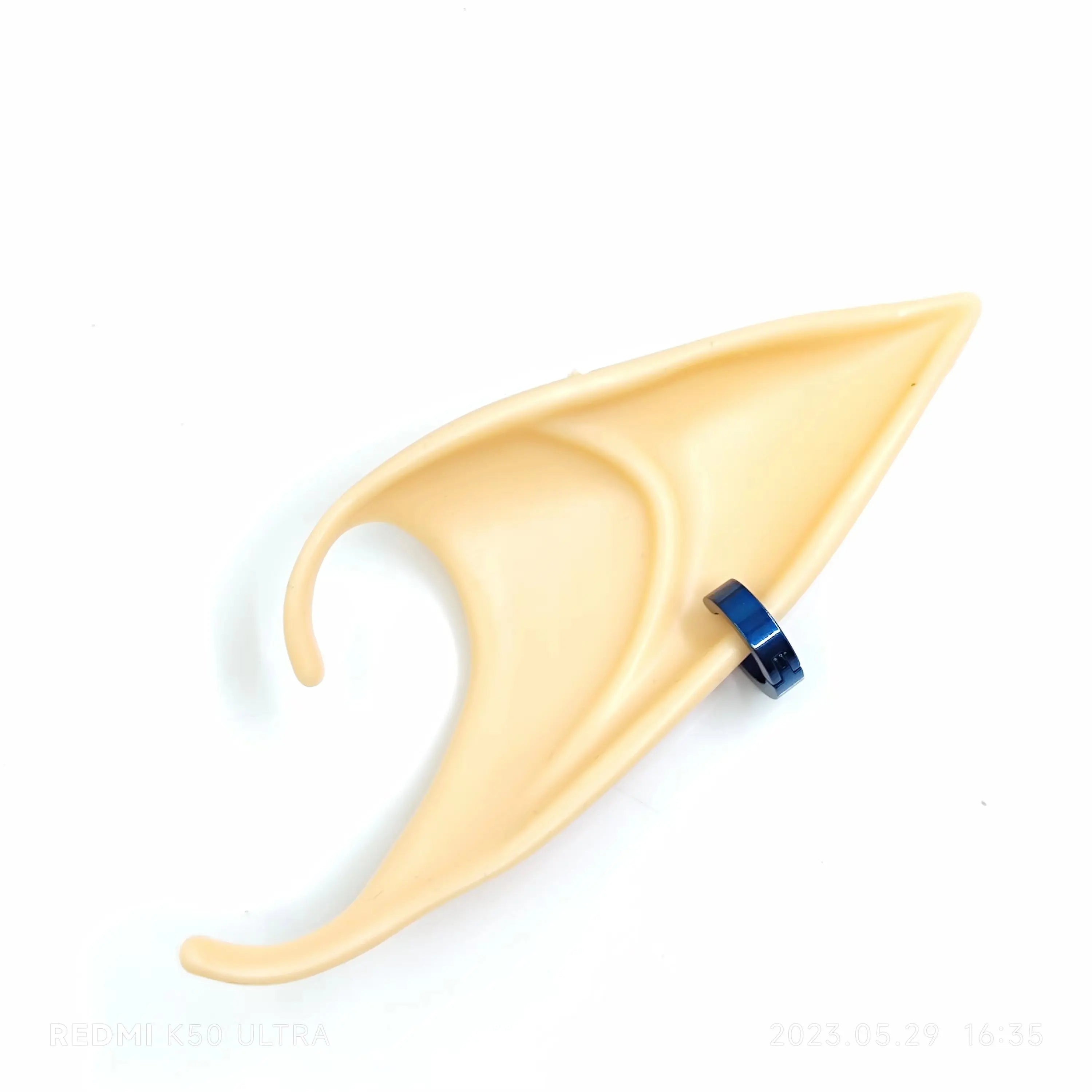 Link cosplay blonde brown heat-resistant synthetic wig with elf ears accessory on beige display head