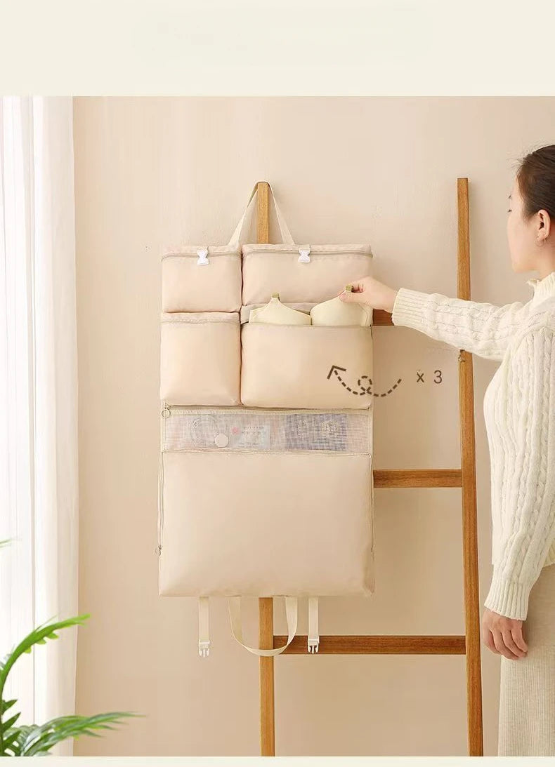 Simples Market Business Travel Storage Hanging Bag in beige fabric with multiple pouches and a mesh pocket