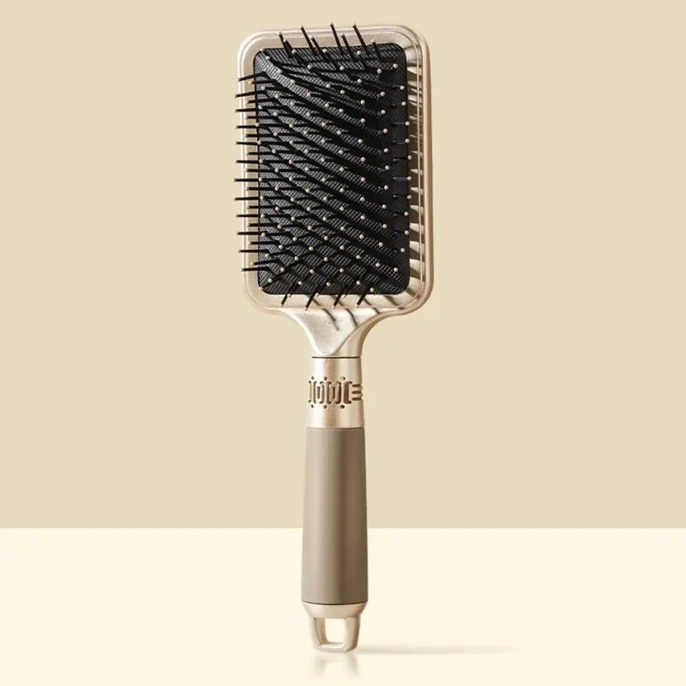 CALIYI hair massage air cushion brush with gold handle and black anti-static bristles