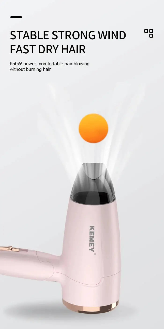 Kemei pink portable hair dryer with compact foldable handle, 950W, ideal for outdoor travel and student use