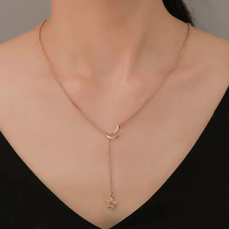 Moon Star Pendant Choker Necklace with gold-tone alloy chain for women, crescent pendant and dangling star charm.