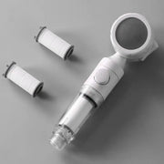 Simples Market travel pressurized shower head with water filter and antibacterial nozzle; white/silver, for hotel use.