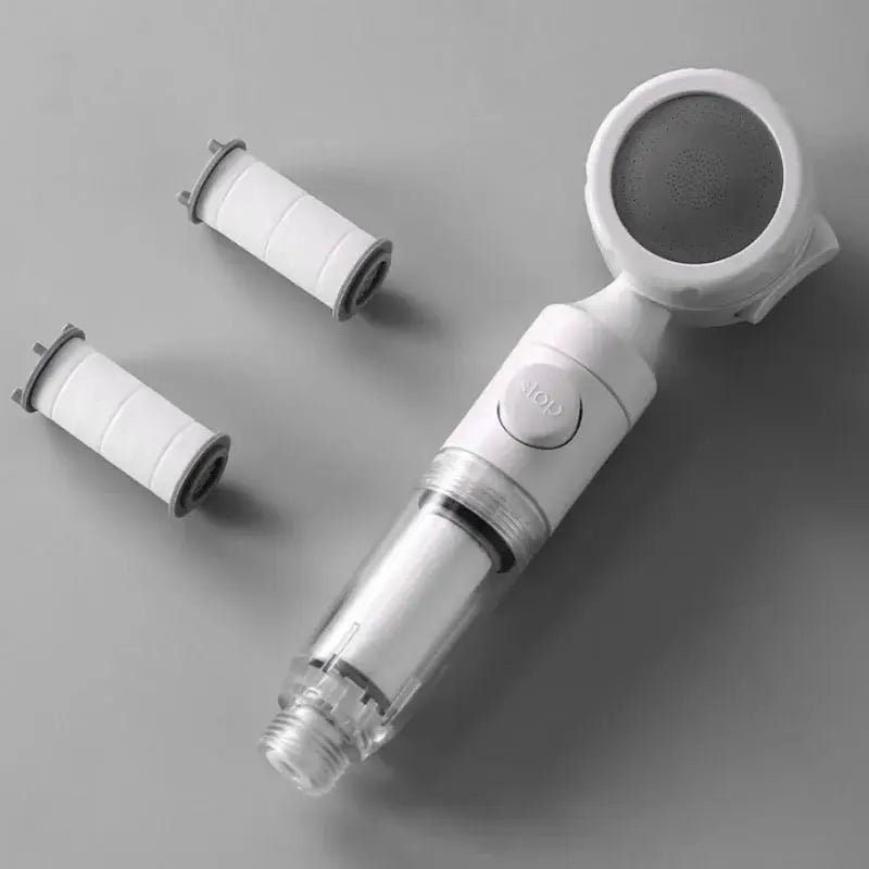 Simples Market travel pressurized shower head with water filter and antibacterial nozzle; white/silver, for hotel use.