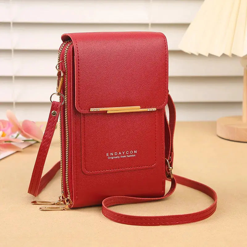 Red crossbody phone bag with card slots, gold hardware, and Endaycon logo.