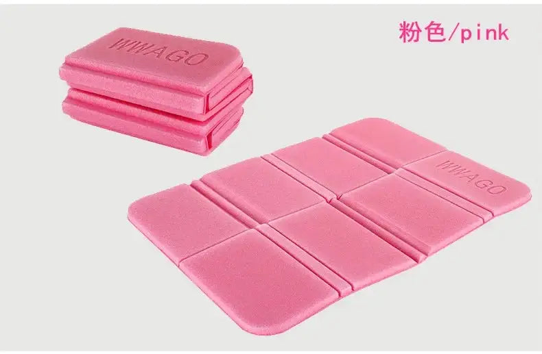 Foldable pink XPE foam picnic mat with WINAGO branding, moistureproof camping seat cushion by Simples Market