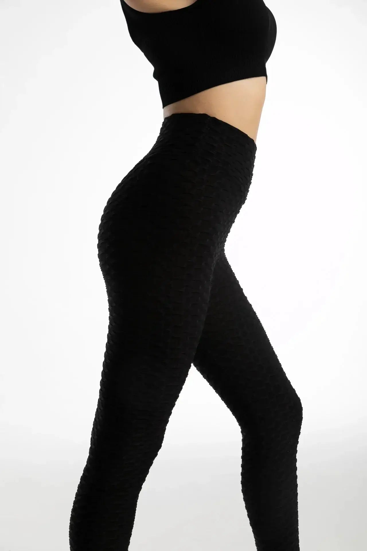 Women high-waist bubble leggings, black seamless textured yoga and gym pants by Simples Market