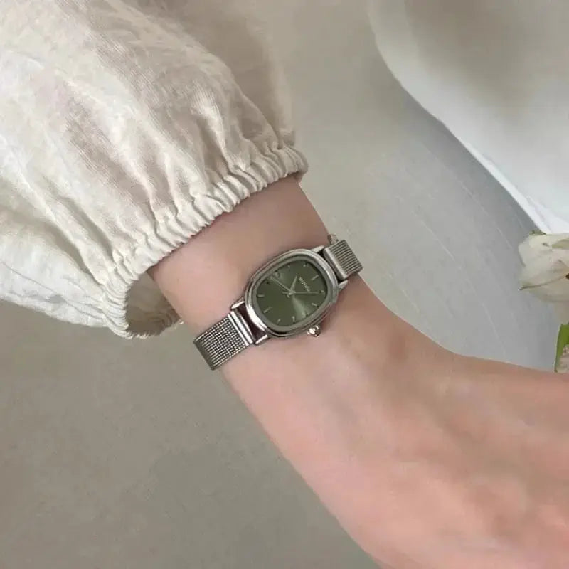 LuxeWear Small Oval Green Dial Stainless Steel Quartz Watch For Women Elegant Everyday Timepiece