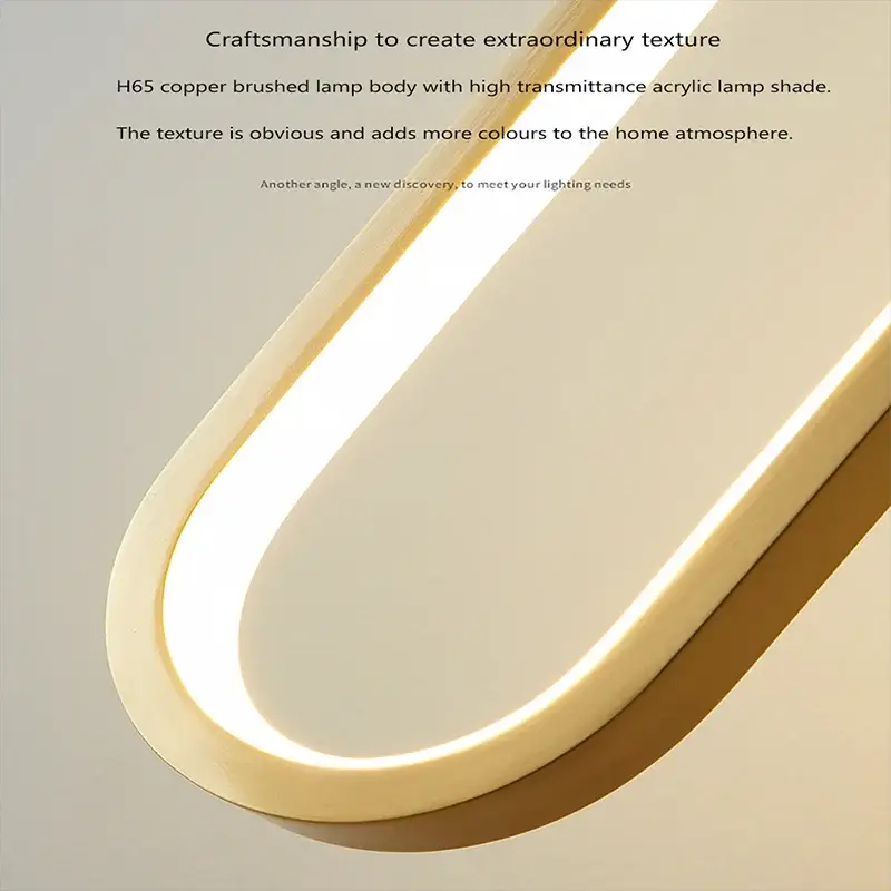 Gold U-shaped LED pendant light with warm-white glow for modern living spaces