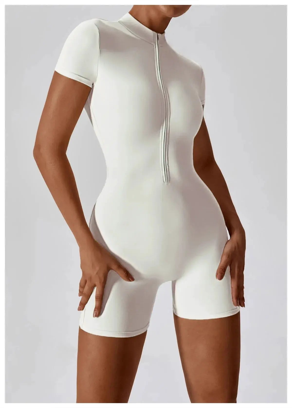 Women's zipper-front short-sleeve yoga jumpsuit by Simples Market; white, quick-dry breathable fitness onesie.