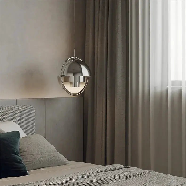Pendant light by Simples Market, chrome iron circular-ring hanging lamp for bedroom decor.