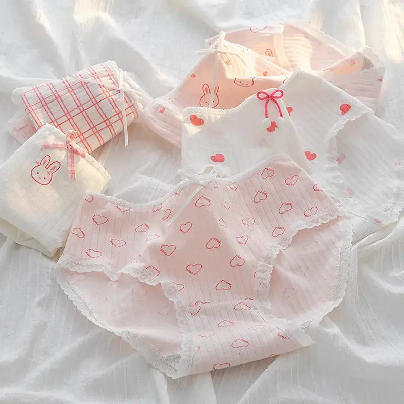 5-piece cotton underwear set by Simples Market; pastel pink and white panties with heart and bunny prints and lace trim