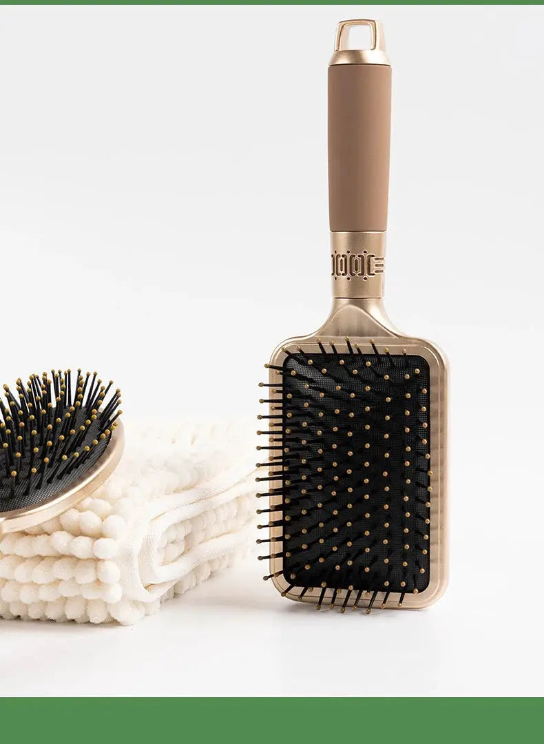 CALIYI hair massage air-cushion brush with rose-gold handle and black cushion; 2-item detangling set