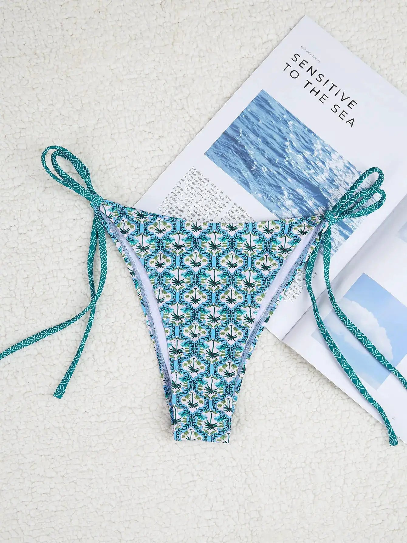 Simples Market triangle bikini set with floral print push-up top and Brazilian bottoms in teal-blue.