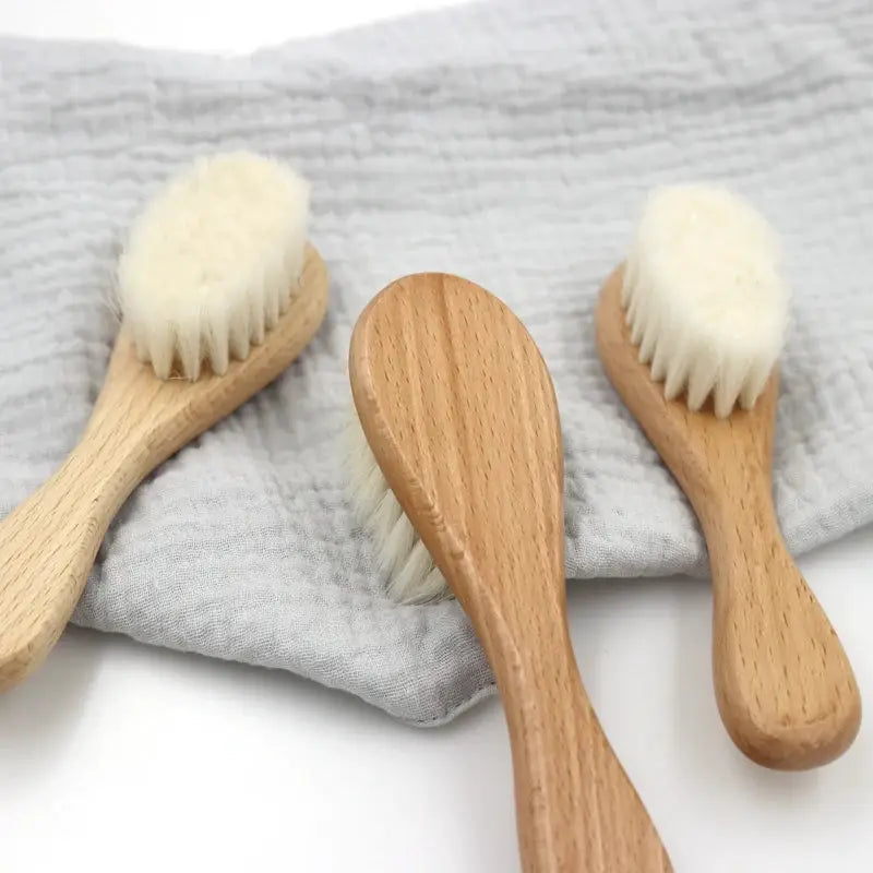 3-piece beech wood baby care brush and comb set with white bristles by Simples Market