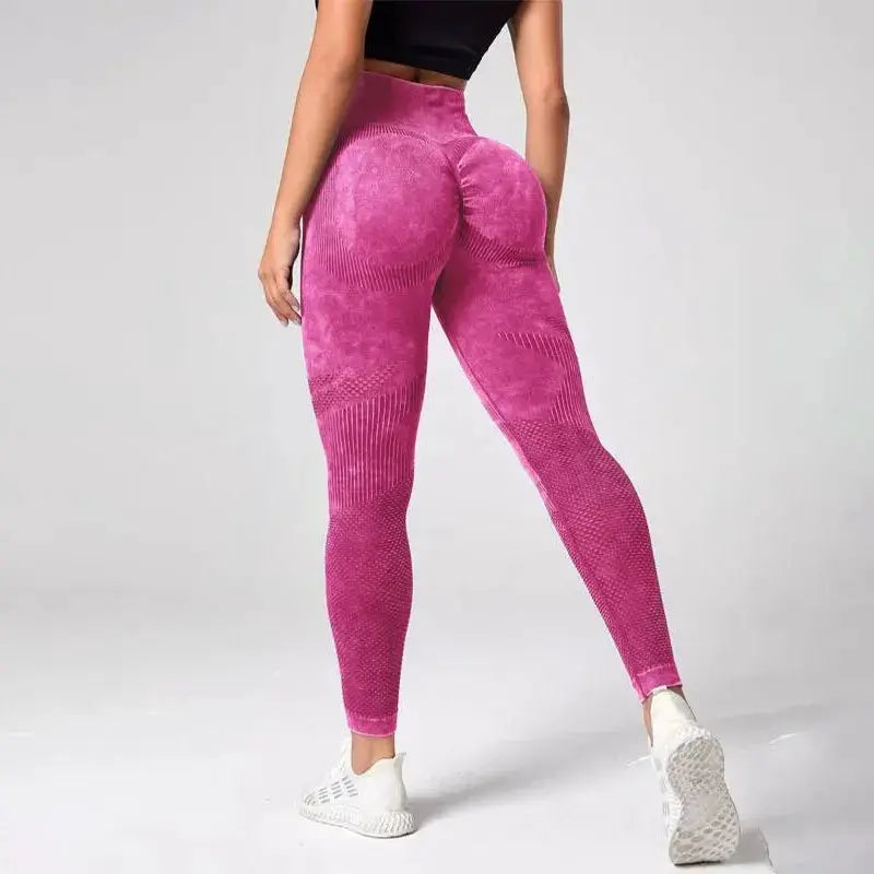 Ladies' pink high-waist seamless yoga leggings with butt-lifting design and quick-dry fabric