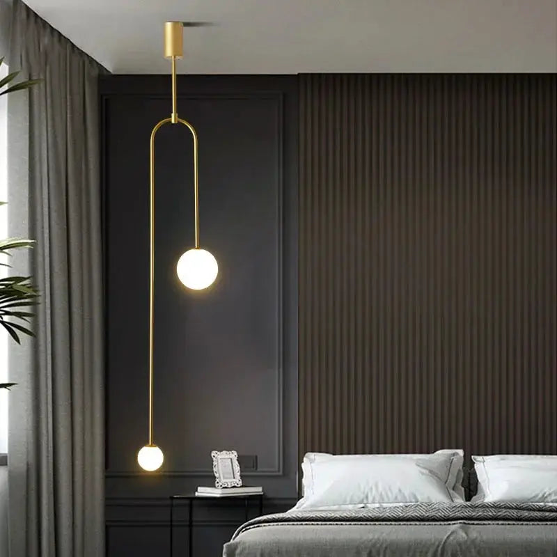 Modern gold glass ball pendant light with two LED spheres, hanging bedside lamp by Simples Market