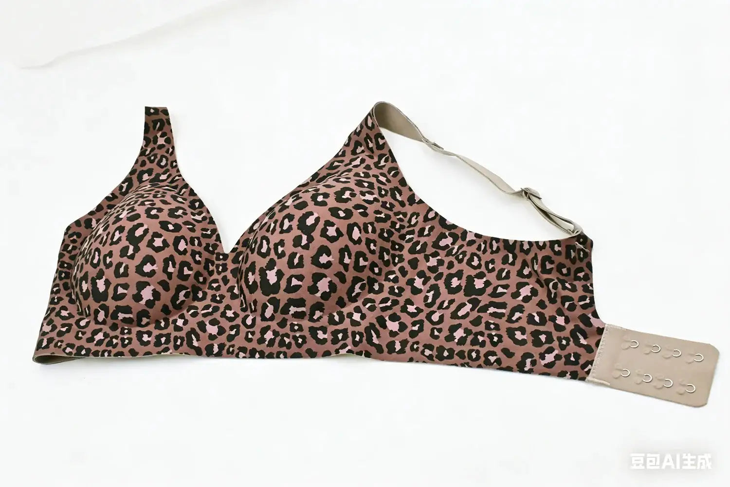 Women's leopard print seamless wire-free full-coverage bra in pink-brown with black spots; wide band and back-closure