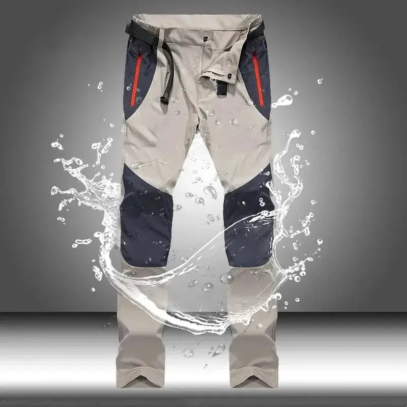 Men's tactical waterproof cargo pants, beige with navy knee panels and red zip pockets, 4XL.