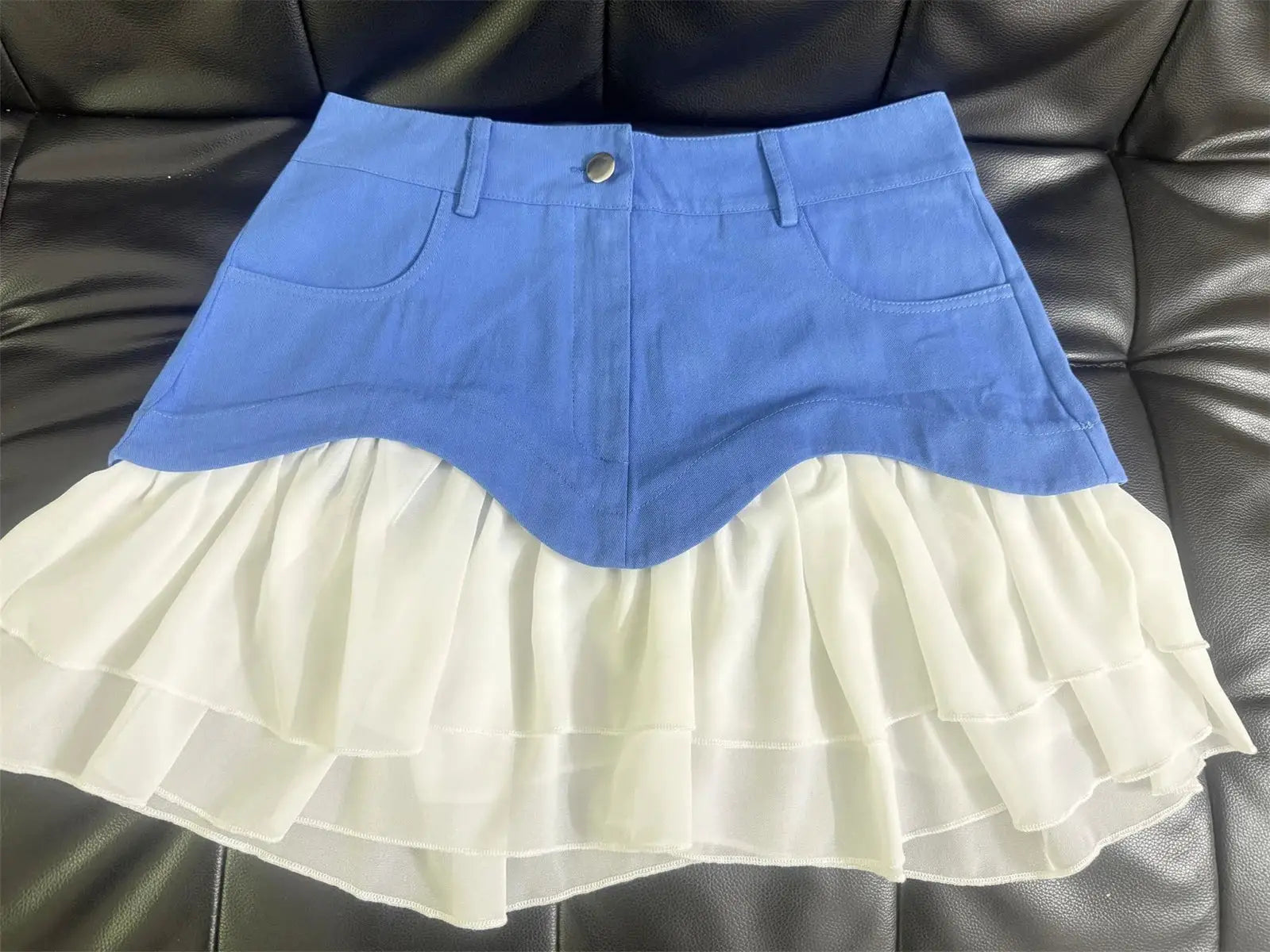 Blue high-waisted A-line skirt with white layered tulle ruffles