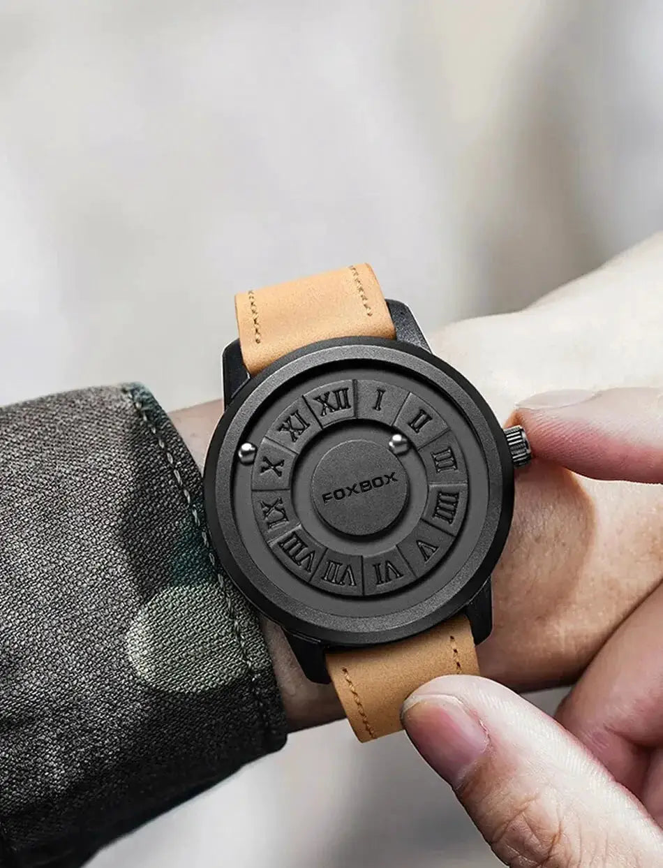 FOXBOX watch with black round case, tan leather strap, and Roman numeral dial.