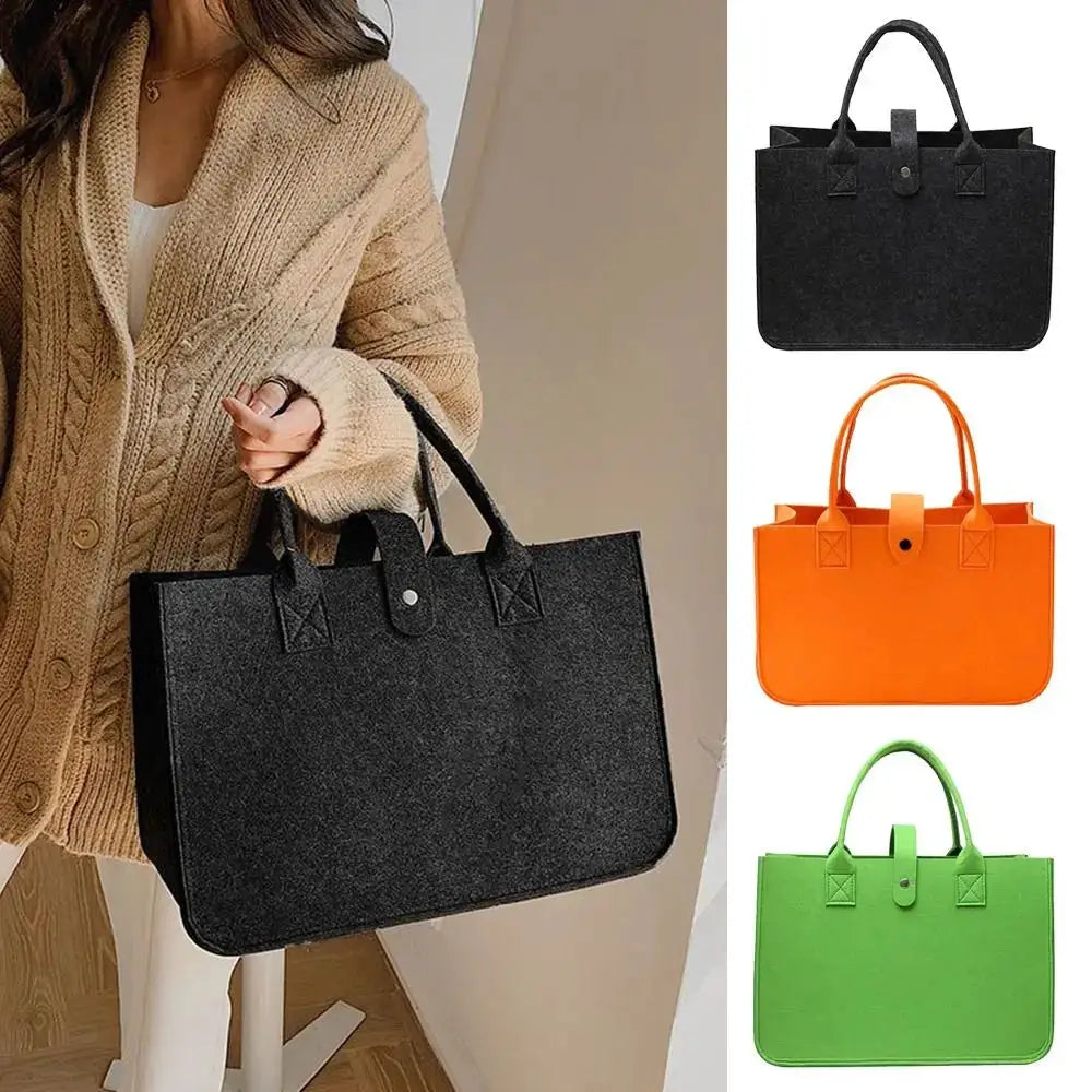 Portable large-capacity mummy bag in black felt with dual handles, also shown in orange and green by Simples Market.