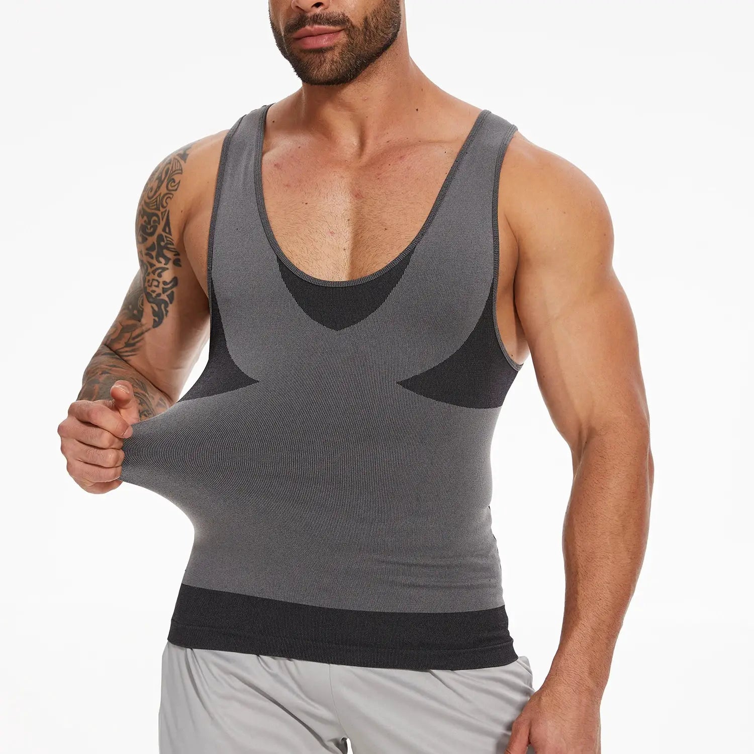 Men's gray shapewear compression top with horizontal stripe panels and cross-elastic design