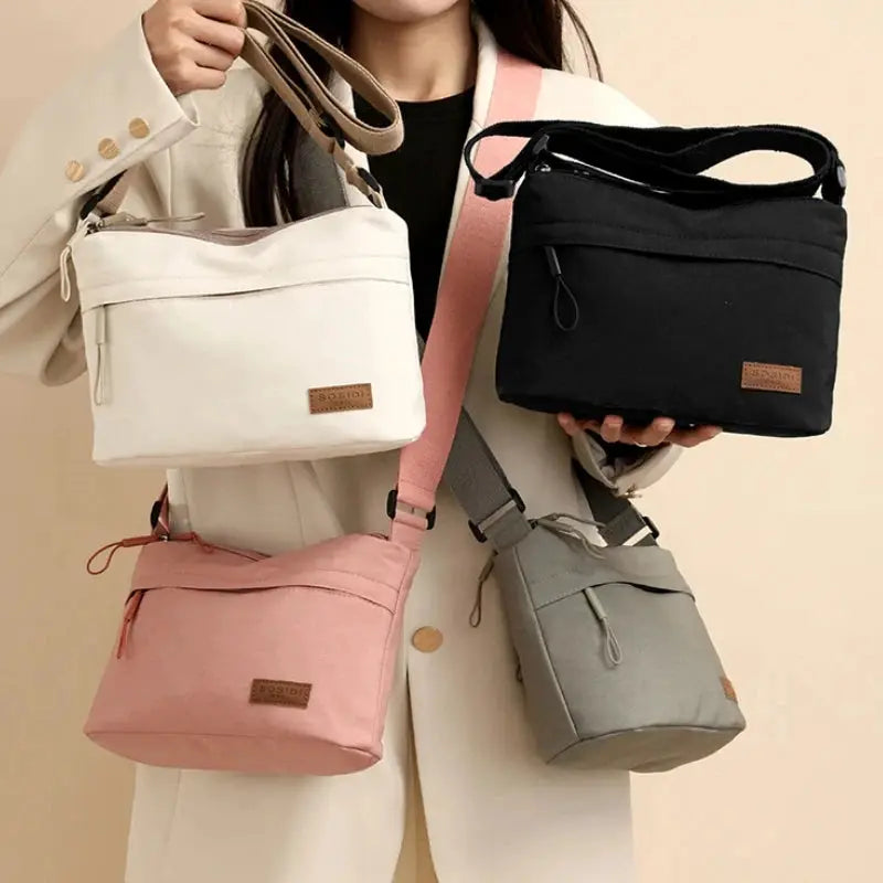 Shoulder crossbody canvas bag set of four with 3 main pockets by Simples Market in white, pink, gray, and black