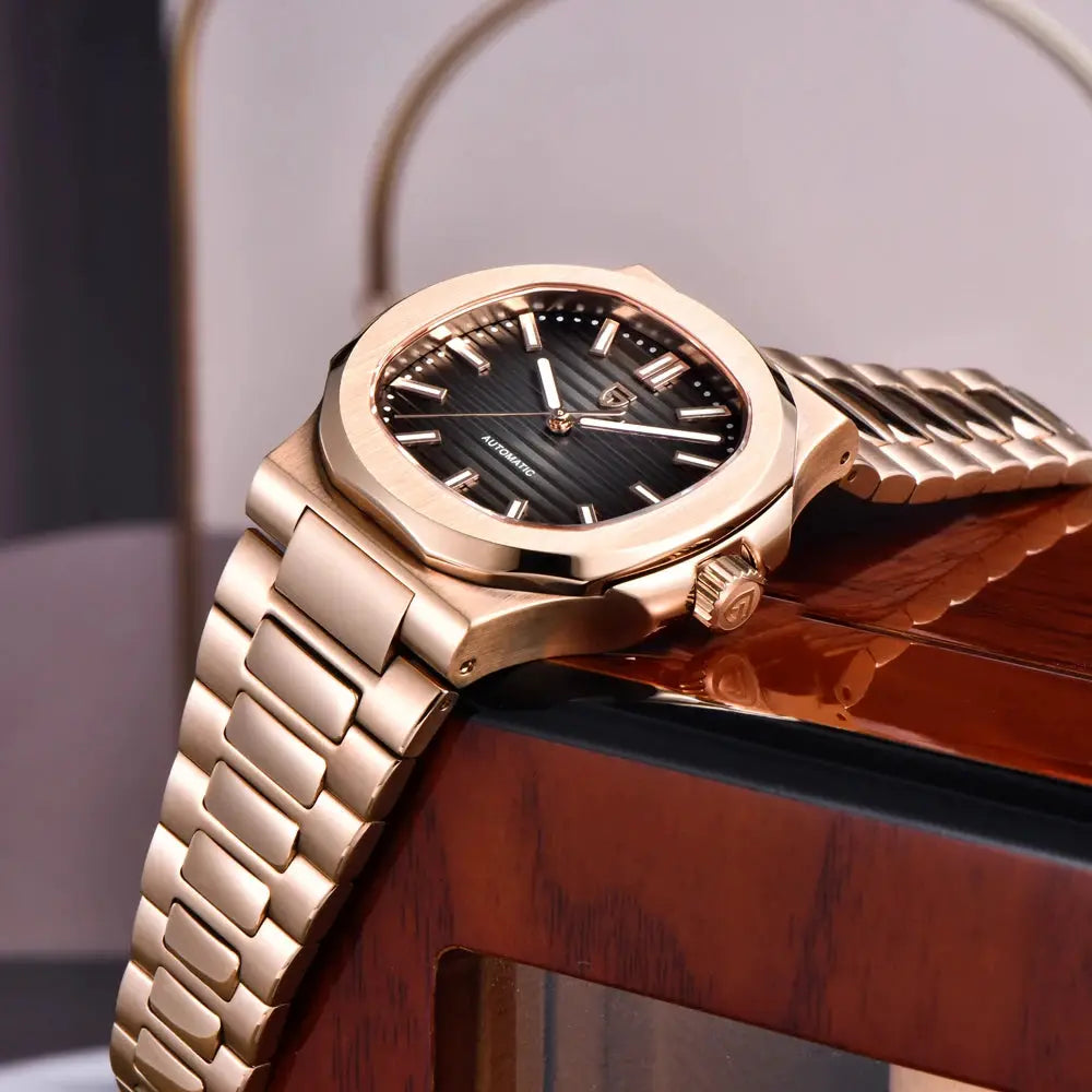 PAGANI DESIGN men's rose-gold automatic wristwatch with black dial and stainless steel bracelet.