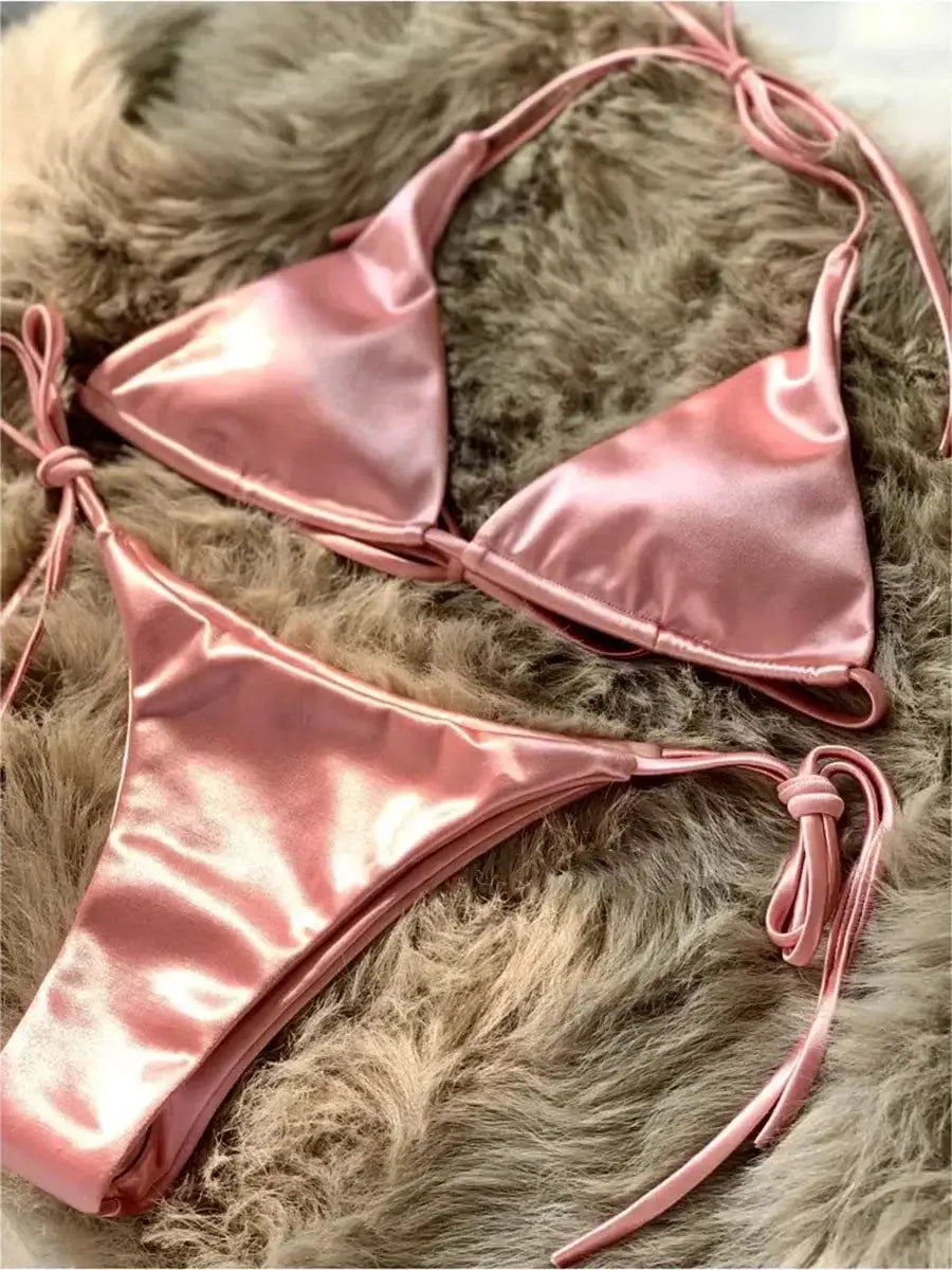 Pink halter bikini set in metallic satin with high-cut bottoms and side-tie straps