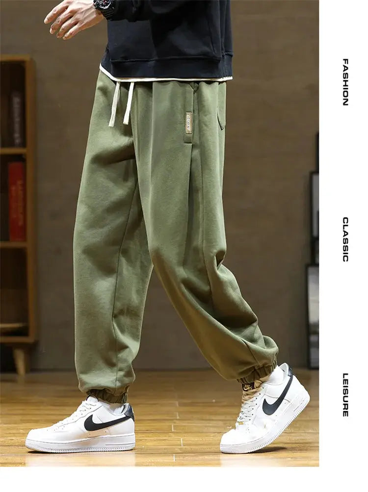 Men's olive green loose drawstring jogger sweatpants with elastic cuffs, plus size 8XL