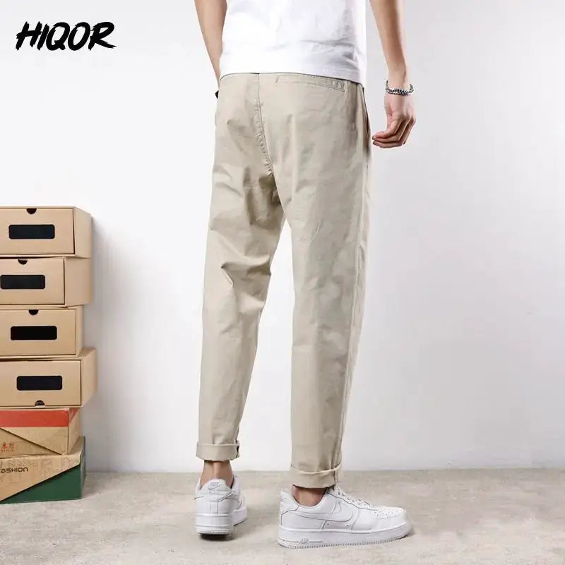HIQOR men's beige cotton casual pants with rolled cuffs, streetwear style.