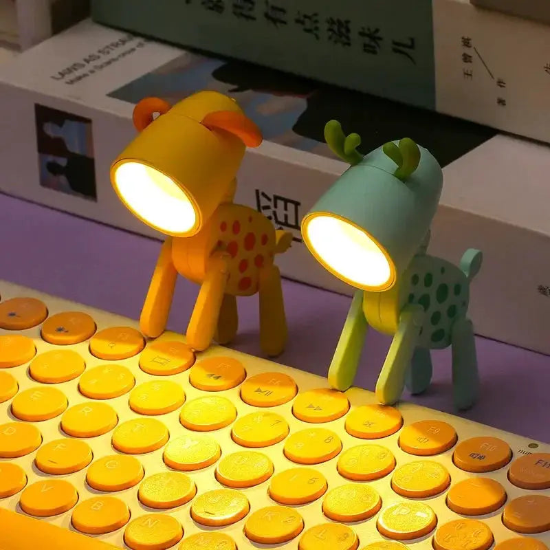 LED Mini Night Light two animal-shaped desk lamps dog and deer by Simples Market on a yellow keyboard