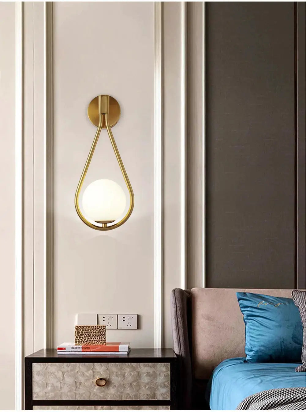 Simples Market Nordic glass ball LED wall lamp with a gold teardrop frame.