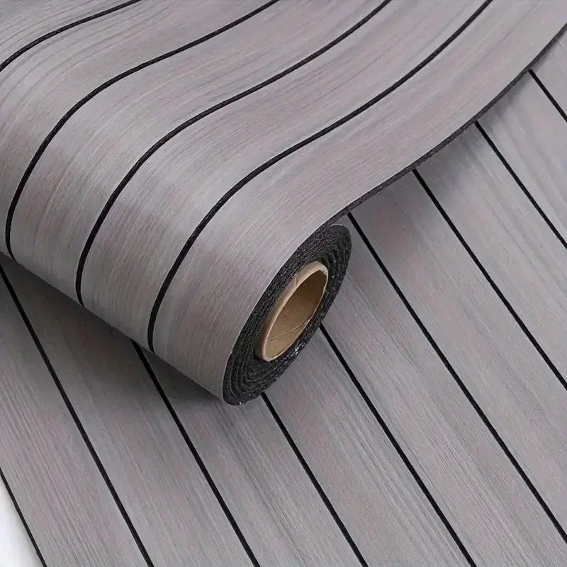 Wood-grain self-adhesive wallpaper roll in grey with black stripes; removable and waterproof.